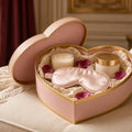 Heart of Gold Mum-to-Be Pamper Box – pink heart-shaped pamper box with candle, eye mask, jar, petals