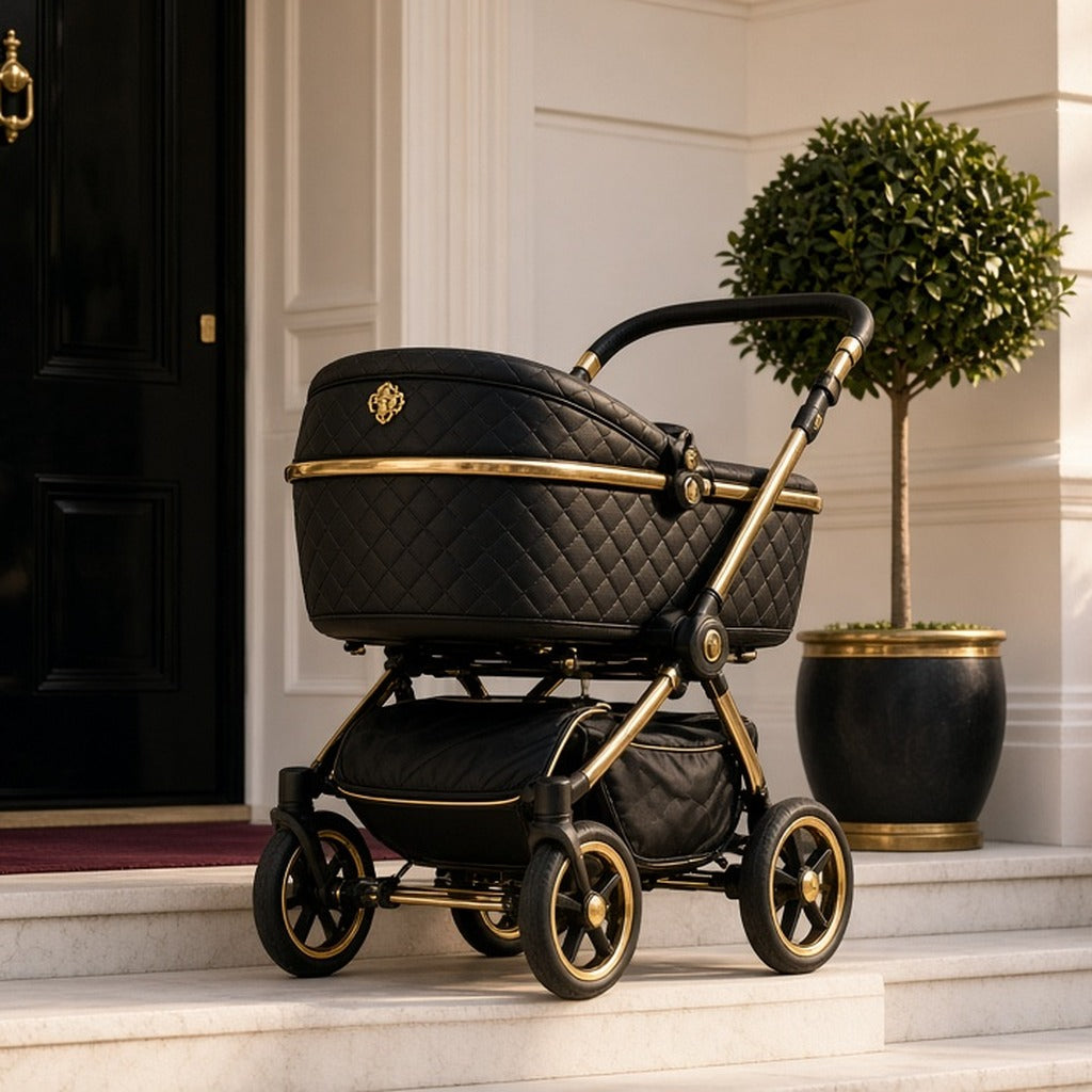 Obsidian Empress Flagship Pram – black quilted pram with gold frame on townhouse steps by a topiary